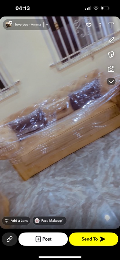 Wrapped sofa set in finished lounge