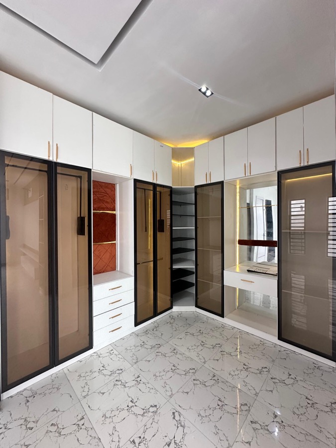 Walk-in wardrobe with fitted storage