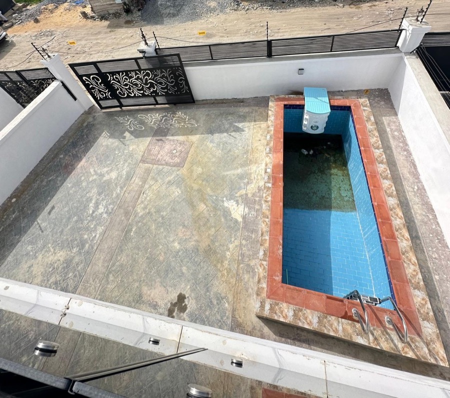 Courtyard and plunge pool with decorative gate