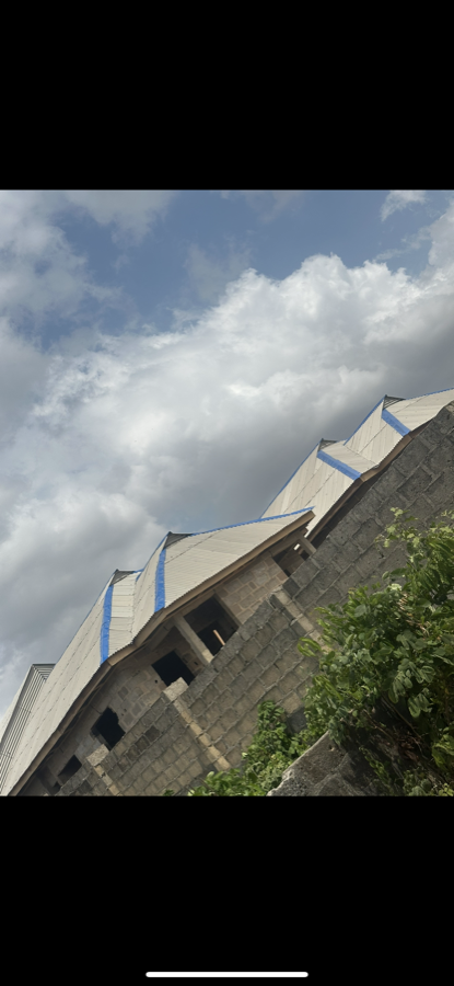 Roofed housing row from site exterior