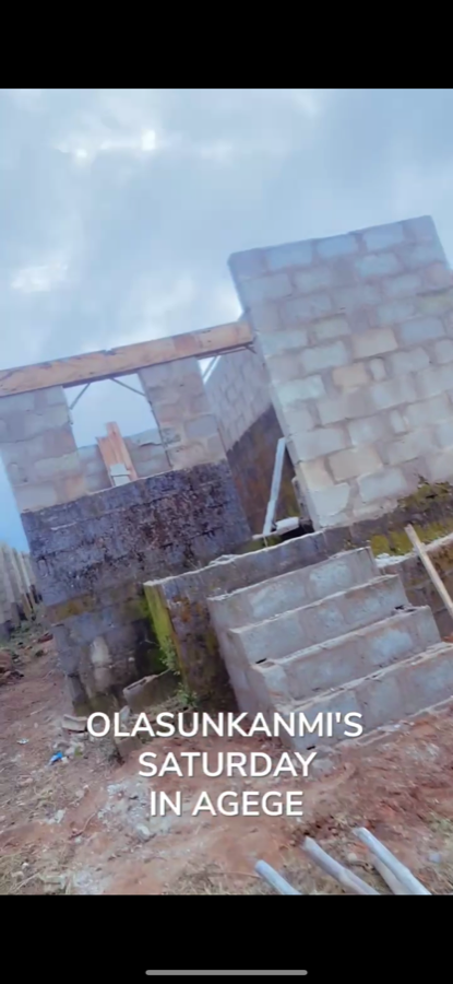 Front steps and raw block structure on site